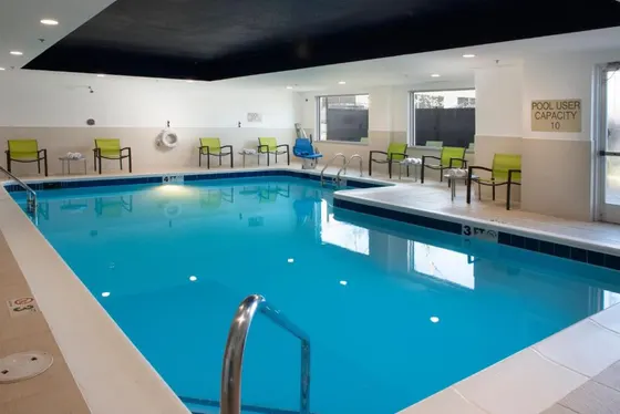 Pool with blue water in a hotel room