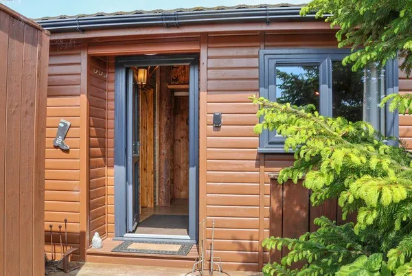 Stag Lodge Holiday Retreat front entrance with timber cladding