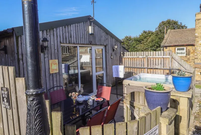 The Old Hen Shed timber conversion with courtyard patio
