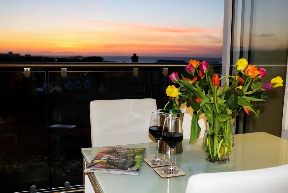 Sunset View sunset dining scene looking out toward the coast