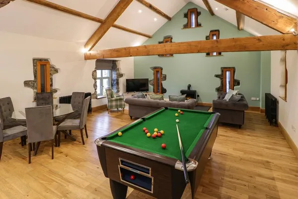 The Barn by Lyons open plan lounge with pool table