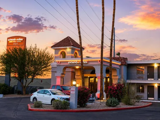 Building with a car parked in front of it