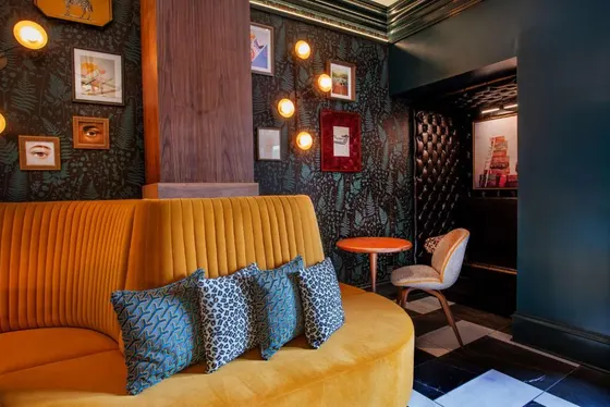 Living room with a couch with pillows on it