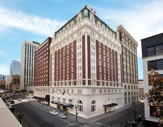 Rendering of a large building on a city street