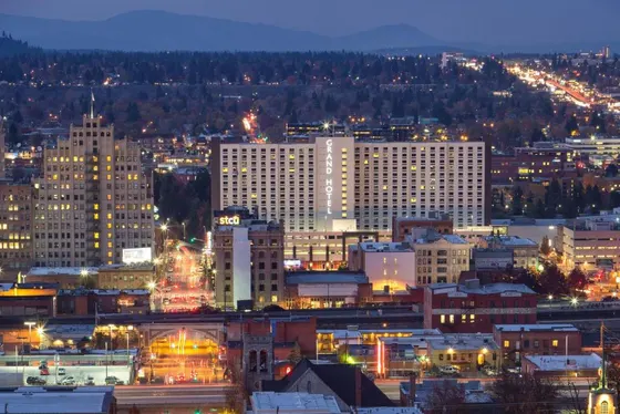 City lit up at night with buildings