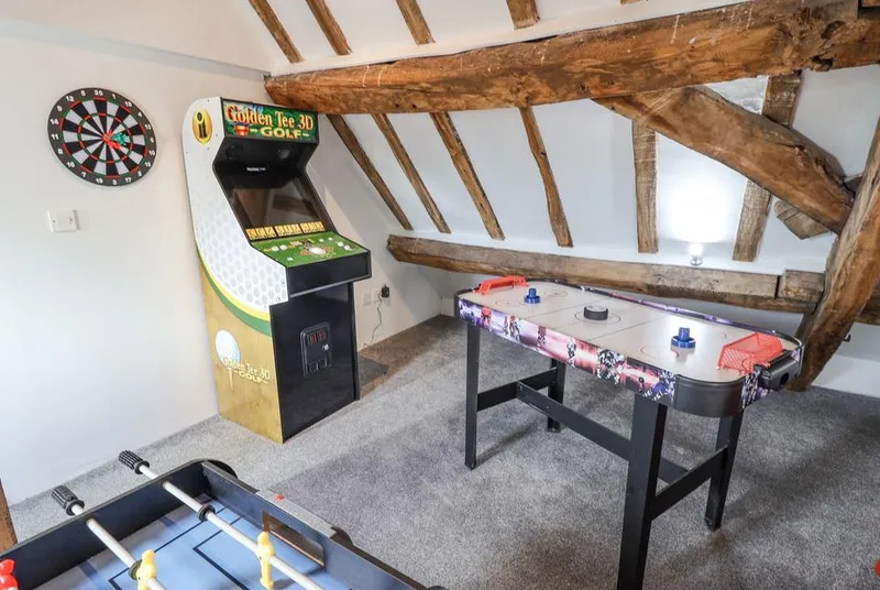 The Gatehouse top-floor games room with arcade and air hockey