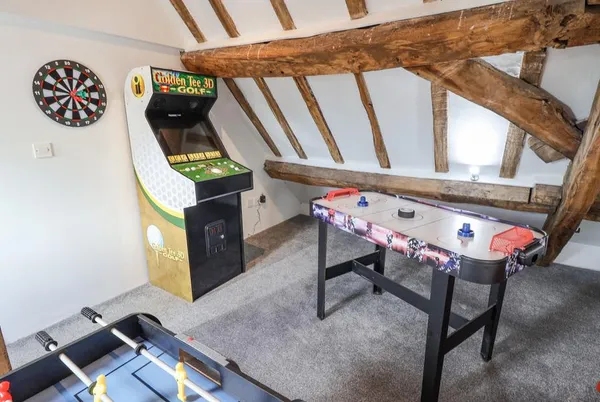 The Gatehouse top-floor games room with arcade and air hockey
