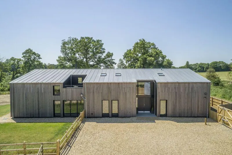 The Grain Store barn conversion frontage with timber cladding