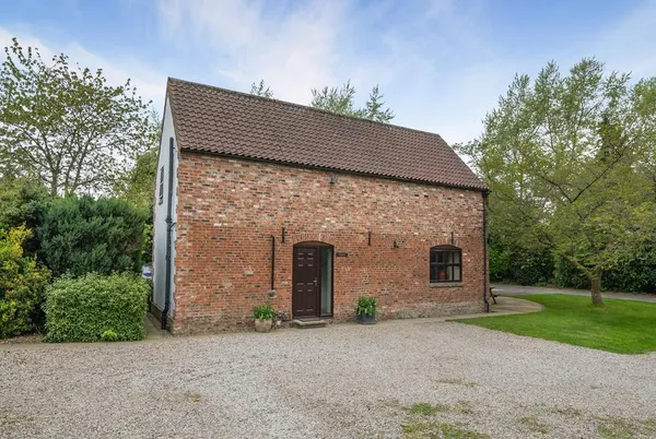 The Hayloft converted 18th century brick barn exterior