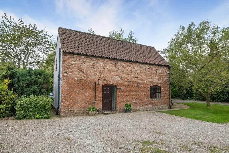 The Hayloft converted 18th century brick barn exterior