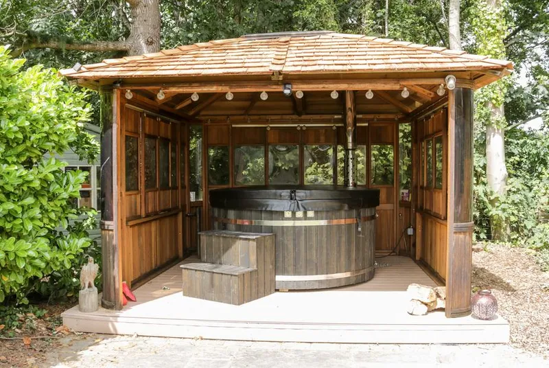 The Old Stable hot tub in timber gazebo