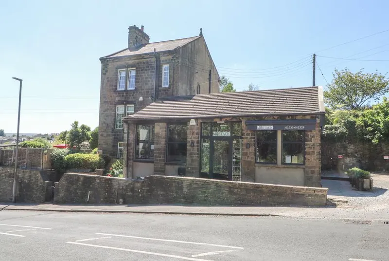 The Stone Masons House stone property with glass extension