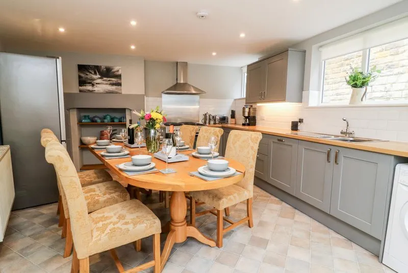 Trillo House grey Shaker kitchen-diner with bay window