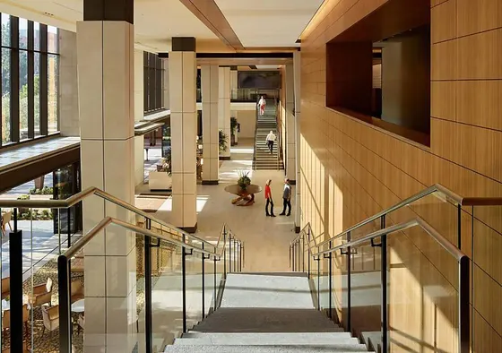 View of a building with people walking down the stairs