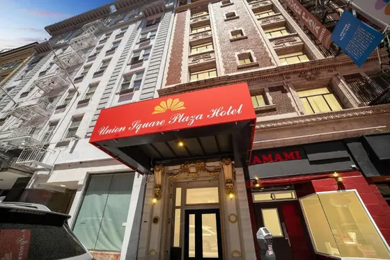 Restaurant with a red sign on the front of a building