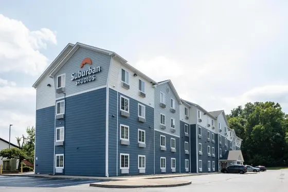 Large building with a sign on the side of it