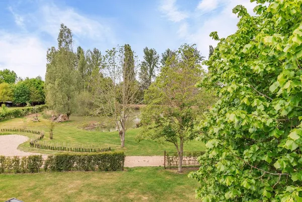 Willow Loft elevated view over rural Suffolk grounds and gardens