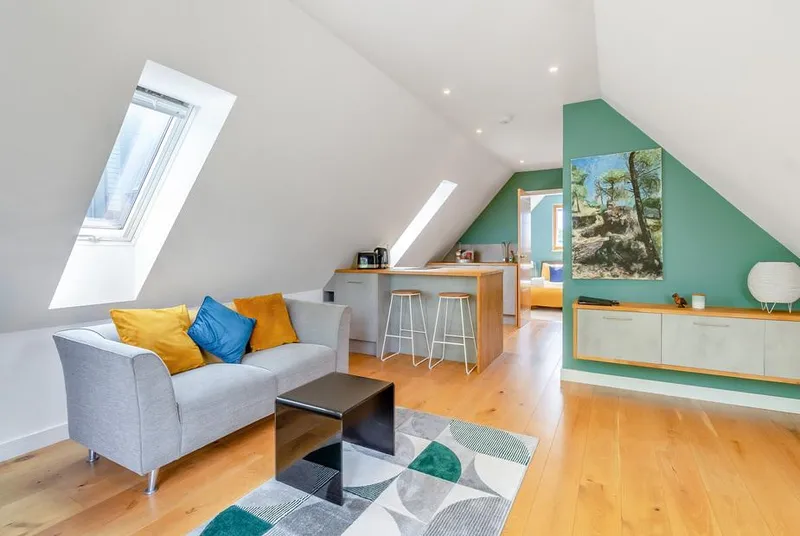 Willow Loft open-plan living area with vaulted ceilings and skylights
