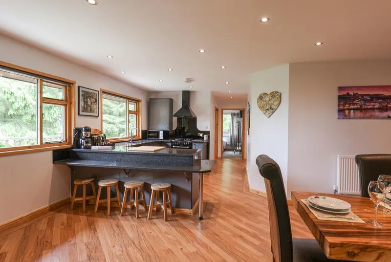 Pond Farm Woodlands open-plan kitchen-diner with bar stools