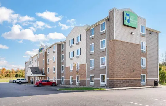 Tan and brick hotel with an Extended Stay America sign